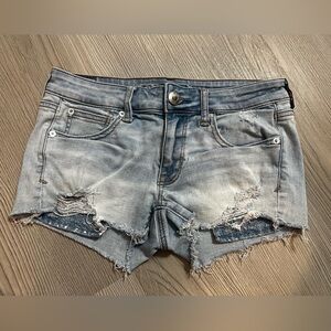 American Eagle “Shortie” Distressed Shorts